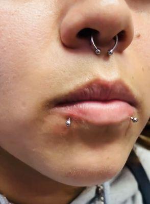 Got my septum and snake bites done by Angel