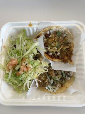 vegetarian taco (left), chorizo taco (top), and carnitas taco (bottom)