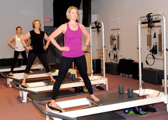 Pilates reformer classes use spring resistance to give challenge for some exercises and support for others.