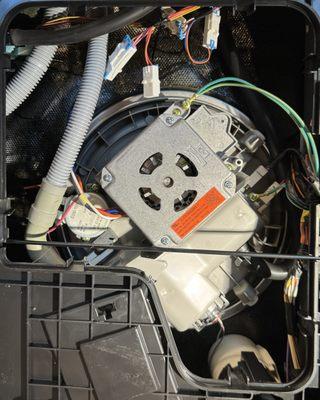 This Samsung dishwasher was draining poorly due to a piece of glass being lodged in the drain hose check valve connected to the drain pump.