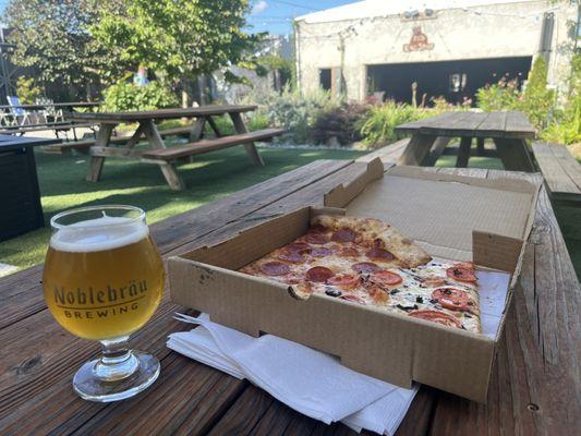 Pizza from a few doors down and a Tripel. Loved the outdoor area.