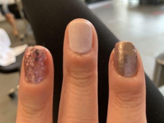 Puddled polish and , uneven nails cuticles look dry and uneven.