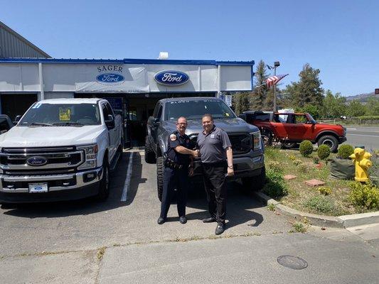 Chief of the Saint Helena Police, welcomes Cal Sager to Saint Helena.