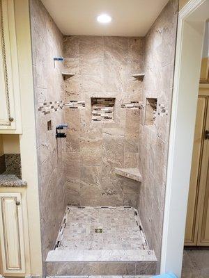 Tile shower with corner seat