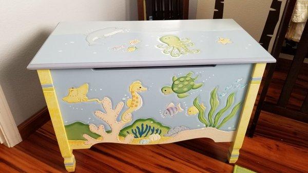 Our beautiful little hand carved hand painted toy chest we bought. $75