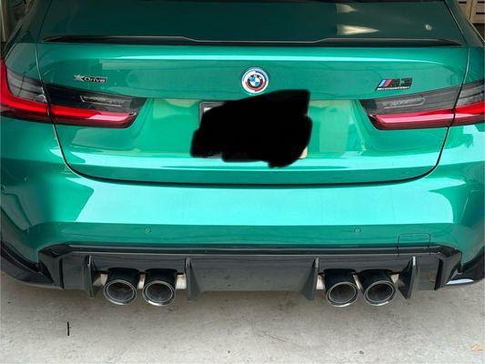 Rear bumper and muffler