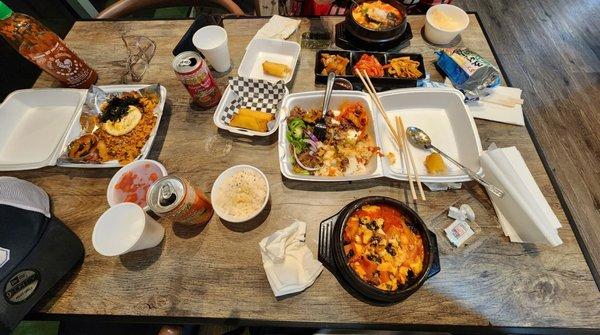 Bilgogi Bowl, kimchi and spam tofu soup, sea food tofu soup, rolls.