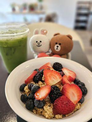 Matcha Latte with Oat Milk and a yogurt bowl... portrait mode