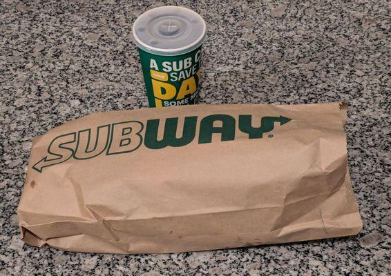 Subway Series combo: #8 The Great Garlic Footlong with a Fuze Raspberry Iced Tea. It also came with a bag of chips