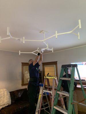 Art Deco Chandelier Installation.