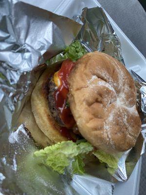 Cheeseburger w/ lettuce, tomato, onions, cheddar, and ketchup for $7.49