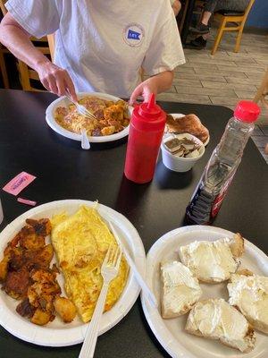 The usual - Cheese Omelette and plain bagel toasted w extra cream cheese, potato's extra crispy