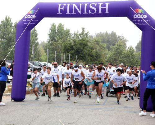 Everyone wearing their 5K shirts so they can get colored during the color run.