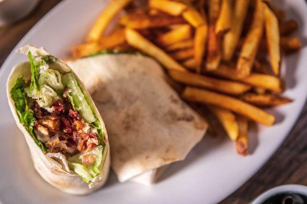 Grilled chicken Caesar wrap with French fries