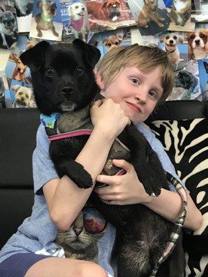 A happy puppy & her little girl.