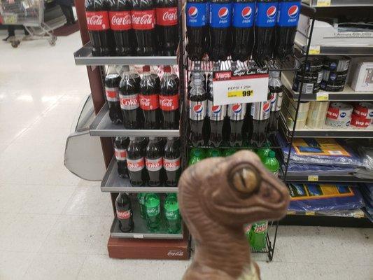 Bob the Raptor says "Coke and Pepsi... the Coke Zero must be around here somewhere!"