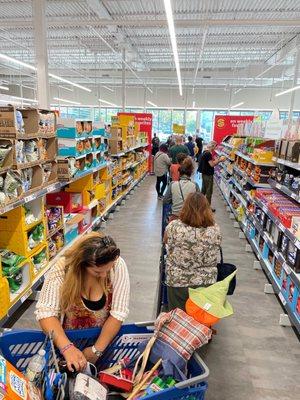 Long line because they never have more than one cashier.