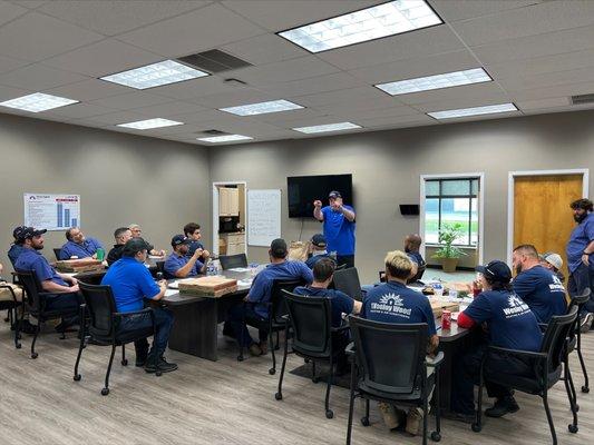 Team of Wesley Wood attending a training, July 2022