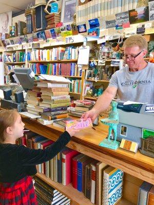 My niece found her favorite book series right away in the Kids Section. She wanted to pay all by herself.