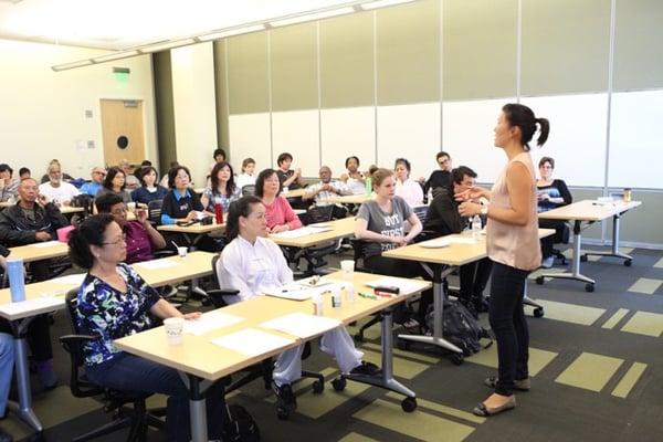 Speaking about nutrition from a traditional Eastern medicine perspective at Ohlone College's Tai Chi & Qi Gong event. Photo by G. Mooney.