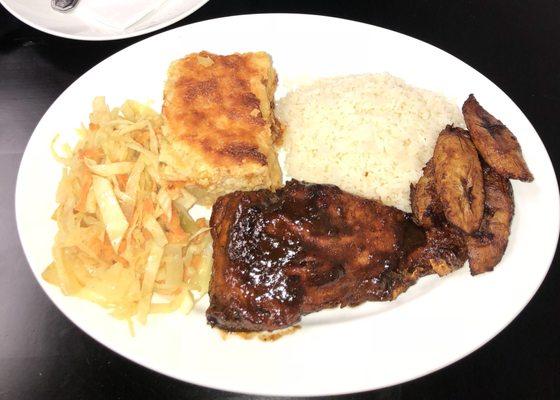 Jerk salmon, Mac and cheese, white rice and plantains good!