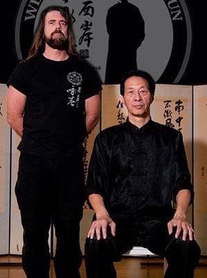 Sigung Samuel Kwok (seated) and Sifu Bryan Talbot (standing)