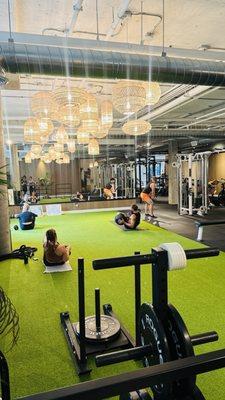 Indoor turf sleds stretch workout areas