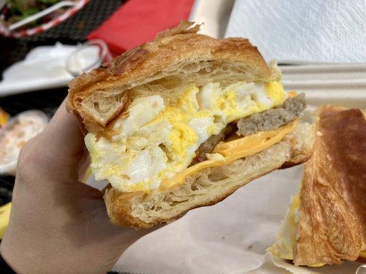 Sausage croissant breakfast sandwich