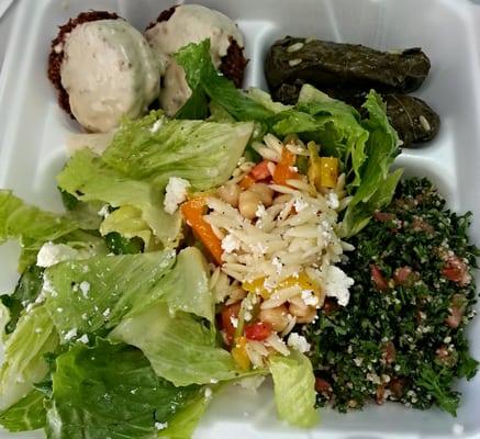 A lil Greek salad, orzo salad, Tabbouleh, grape leaves and falafel