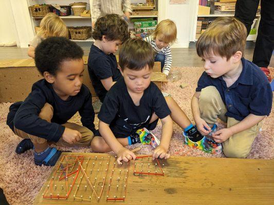 Testing out the nails as we build our GeoBoard