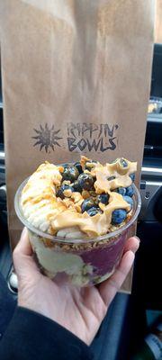 Custom bowl: Base: 1/2 Acai, 1/2 Matcha Mix: granola, macadamian nut, bananas and blueberries Top: peanut and almond butter