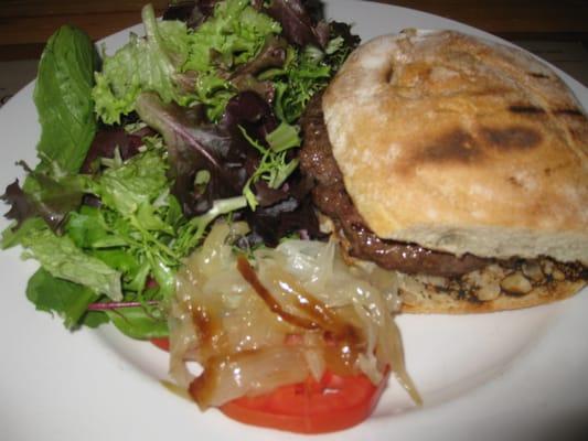 burger with lightly dressed salad