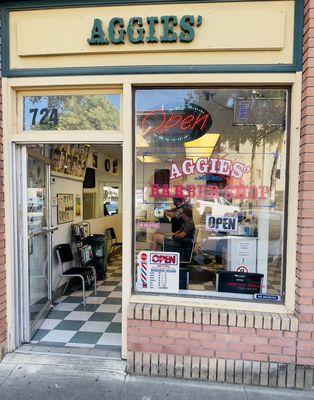 Aggie's Barber Shop store front.