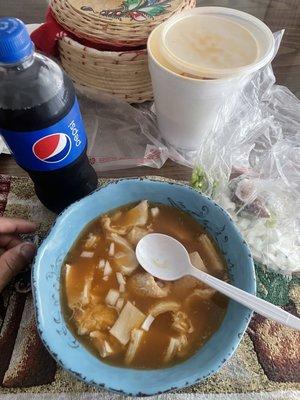 The menudo with some green Chile picado and my Pepsi