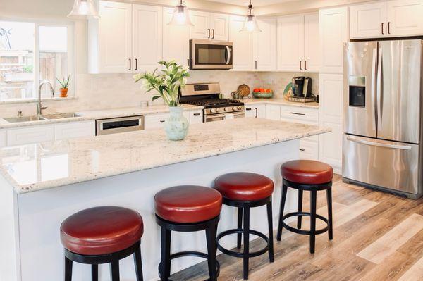 Complete Kitchen Remodel with Shaker White Kitchen veined beautiful granite top, can lights, new Window and Luxury Vinyl Tile Flooring!