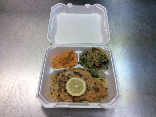 Lemon-caper chicken with fettuccine and mashed sweet potato and quinoa side.