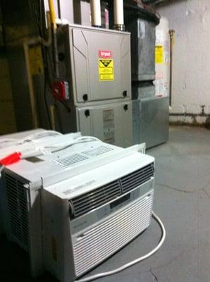 My new heater and A/C next to Sheridan's window units.