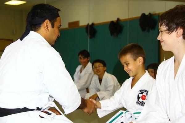 Sensei Robles Congratulating Testers