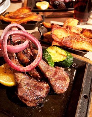 Lamb chops with a side of smashed fries