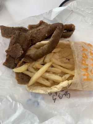 California pita. Missing fire feta but includes undercooked soggy cold fries and dry ass gyro meat.