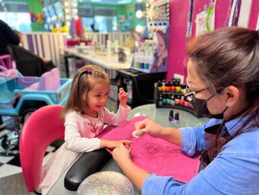 She was so excited to get her nails done.