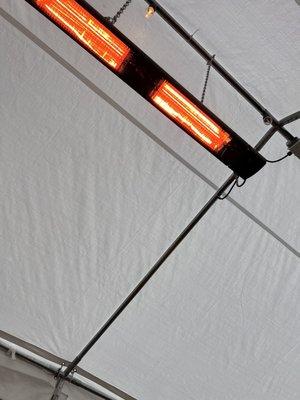 Heat lamps in the tent outside - they're so warm it's lovely in this tent!