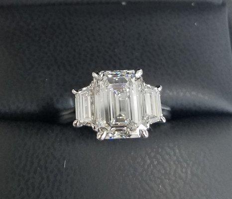 3 carat Emerald cut with trapezoid sides set in platinum