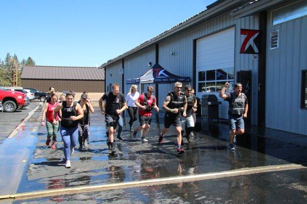 7K CrossFit Murph on Memorial Day. 1 mile Run 100 Pull-ups 200 Push-ups 300 Squats 1 mile Run. In memory of Navy Lieutenant Michael Murphy