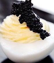 Turn a regular deviled egg into a fancy appetizer by topping it with our caviar