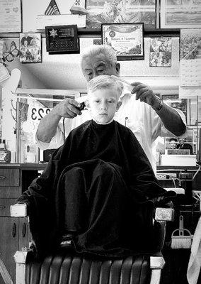 He doesn't look it but little guy is so excited for his haircut!