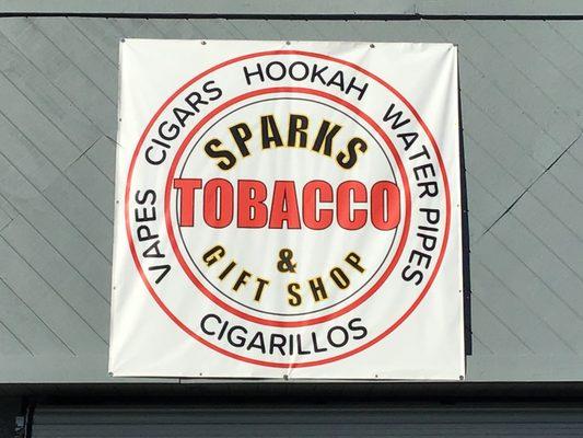 Are you trying to find us? Just look for the banner and you'll find us. Sparks Tobacco & Gift Shop has what you need.