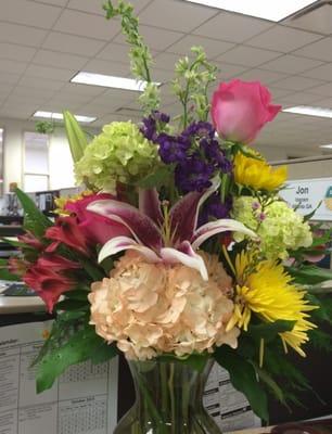 Received this beautiful arrangement at my office from Eneni's Garden as a gift. Perfectly arranged variety of flowers.