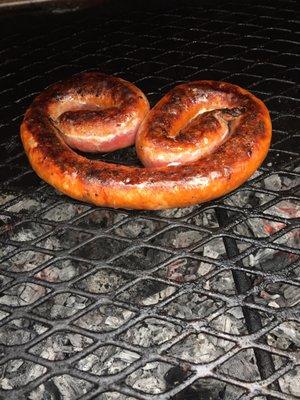 Grilling up some hot sausage for dinner.