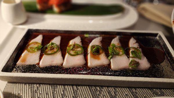 Yellowtail with Jalapeno.  Be sure to pour the sauce over before eating.